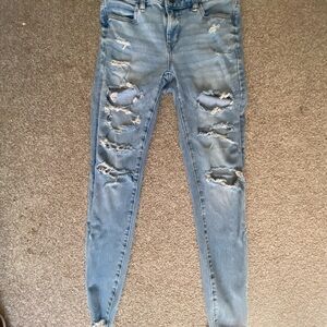 Distressed Blue Jeans